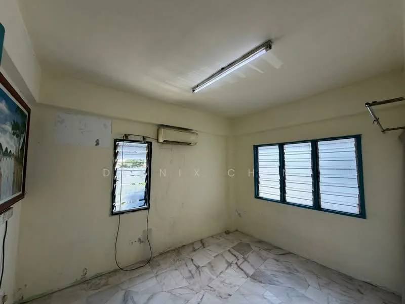 Room features: white painted walls, marble flooring, 2 windows with metal grilles, 1 wall-mounted split AC, fluorescent ceiling light, exposed ceiling, corner wall with peeling paint, no visible furniture.