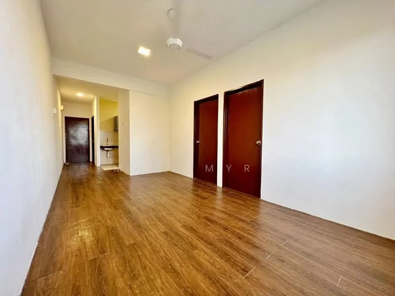 Room features: wooden flooring, white painted walls, ceiling fan, two wooden doors, open layout, natural light from windows, no visible furniture, neutral color scheme; style: modern.