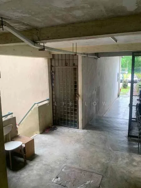 Exterior features: concrete flooring, plain beige walls, metal gate, staircase leading up, security grill, outdoor lighting, open space, surrounding greenery; style: minimalist.