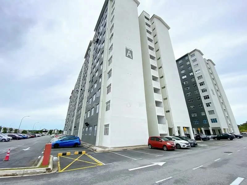 Exterior type: mid-rise condominium; features: white painted facade, grey painted facade, approximately 5-storey building, parking lot with marked spaces, multiple vehicles visible, surrounded by open space, sidewalk along the building, windows with black frames; style: modern.