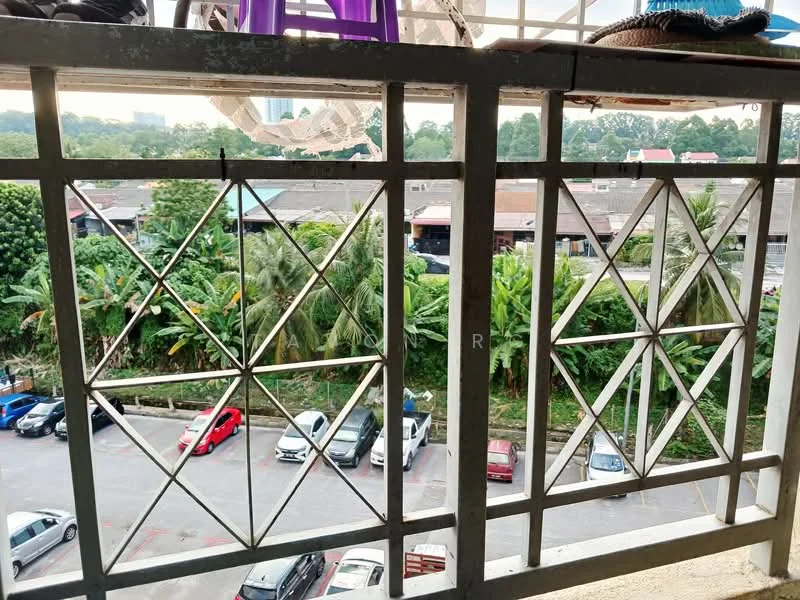 Room features: metal window grille, view of greenery, view of parked cars, balcony railing, outdoor area visible; view: garden.