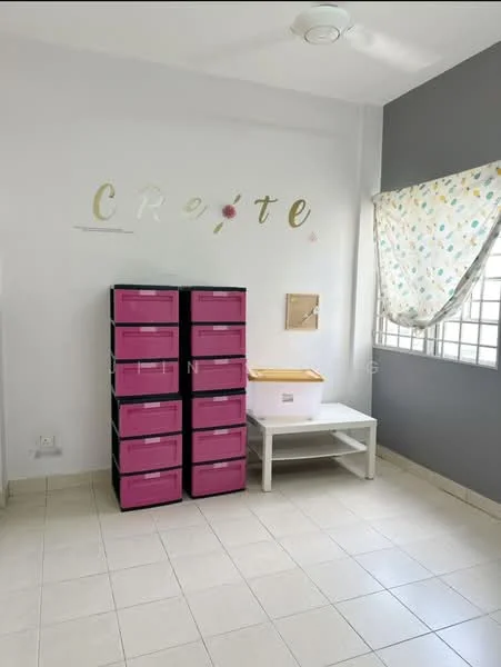 Room features: white painted walls, grey accent wall, tile flooring, ceiling fan, window with sheer curtains, storage unit with pink drawers, white table, decorative wall lettering; style: modern.