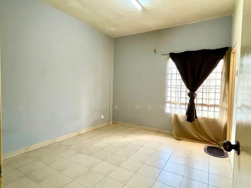 Room features: light grey painted walls, tile flooring, window with grid pattern, black curtain, natural light from window, single light fixture on ceiling.
