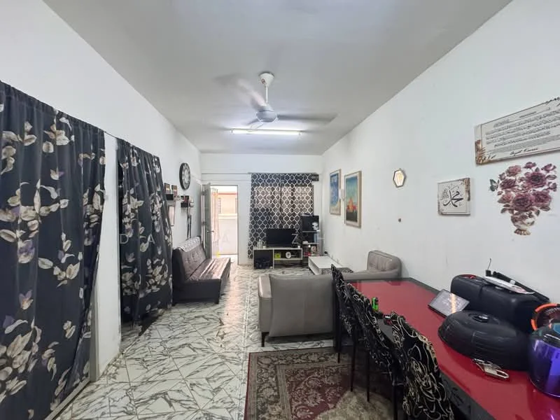 Living features: white painted walls, marble tile flooring, 5-blade ceiling fan with light, sofa in dark brown, 2-seater grey fabric sofa, black TV console, wall-mounted TV, dining table with red surface, 6 upholstered dining chairs, decorative wall art, black curtains with floral pattern, area rug with geometric pattern, clock on wall; style: modern.