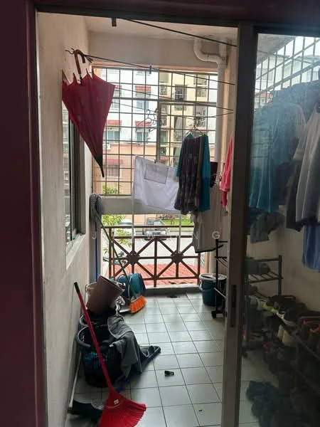 Balcony features: tiled flooring, metal railing, clothes drying rack, hanging clothes, broom, plastic storage bins, shoe rack, window with metal grilles; view: street.