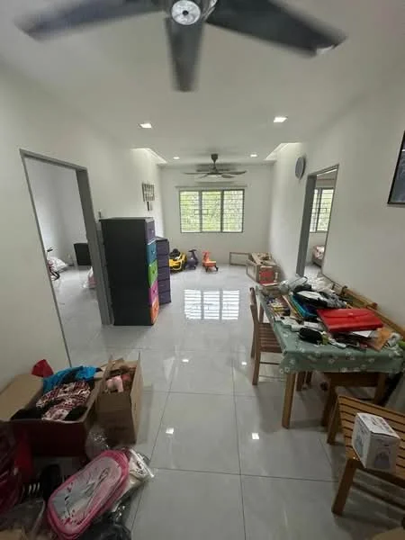 Room features: white painted walls, glossy ceramic tile flooring, 5-blade ceiling fan with light, large windows with natural light, wooden dining table with chairs, various boxes and items on the floor, colorful storage cabinet, open layout, multiple doorways leading to other rooms; style: modern; view: garden.