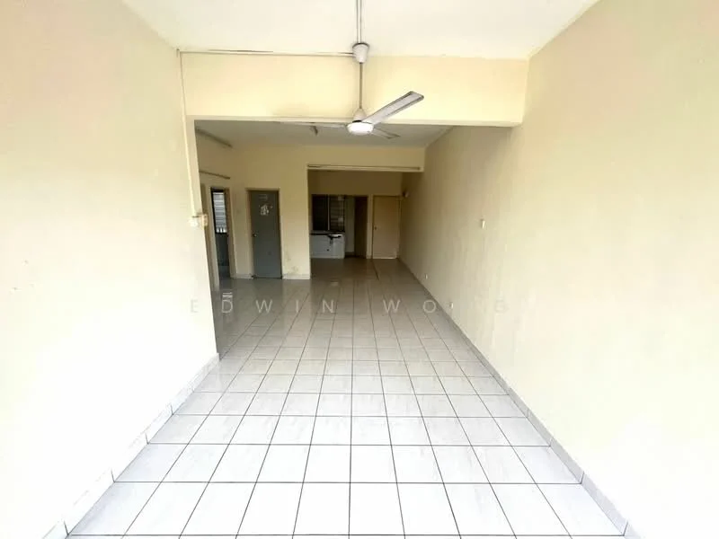 Room features: cream painted walls, white tiled flooring, ceiling fan, doorway leading to another room, windows with no visible treatments, light switch, power outlet, open layout.