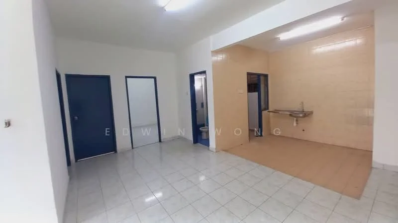 Room features: white painted walls, cream tiled flooring, two blue doors, one white door, kitchen area with wall-mounted sink, light fixtures on ceiling, open layout, no visible appliances; style: minimalist.