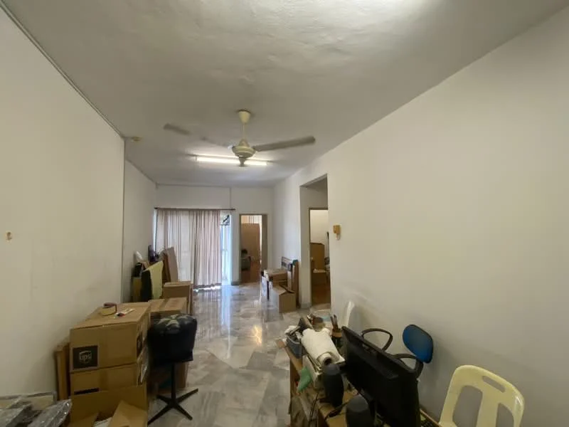 Living features: white painted walls, marble flooring, 5-blade ceiling fan, large window with sheer curtains, sofa, wooden coffee table, cardboard boxes, office chair, plastic chair.