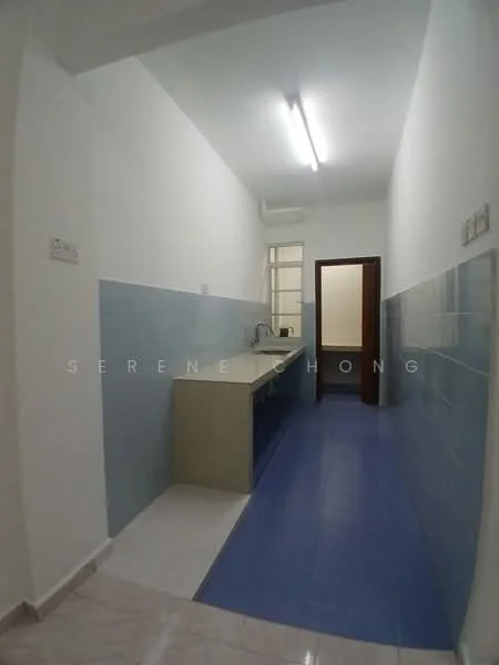 Kitchen features: light blue tiled walls, white painted walls, light blue tile flooring, white countertop, single-bowl stainless-steel sink, chrome pull-down faucet, fluorescent ceiling lights, window for natural light.