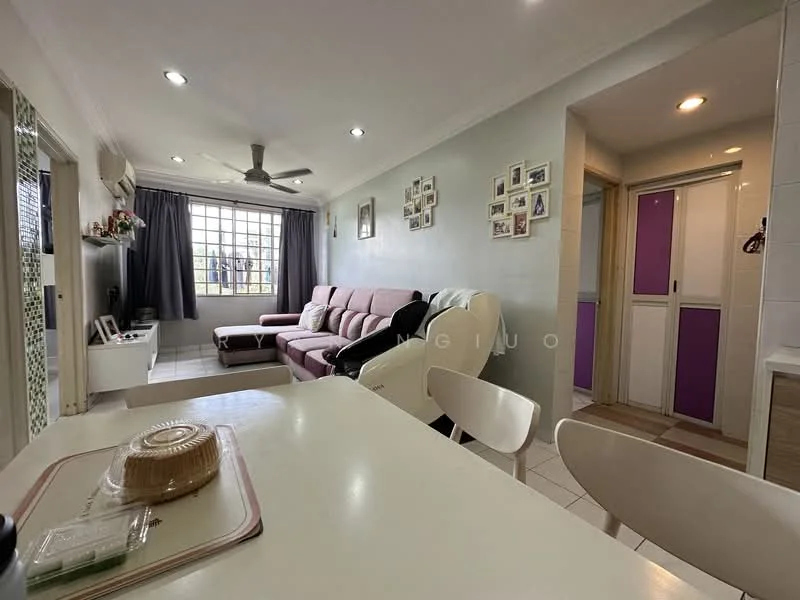 Living features: 3-seater fabric sofa in light pink, coffee table, wall-mounted TV, ceiling fan, recessed downlights, decorative wall with photo frames, tile flooring, large window with grid pattern, open layout to dining area; style: modern. Dining features: dining table with white chairs, light-colored tabletop, open shelving unit, kitchen entrance visible; style: modern. Hallway features: doorway to utility area, purple accent doors, light-colored walls.