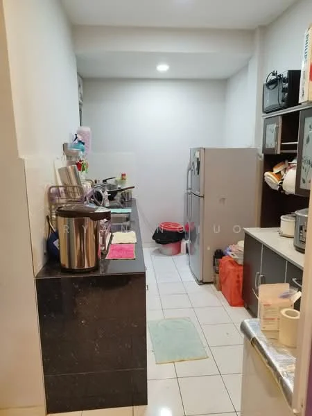 Kitchen features: black granite countertop, stainless-steel fridge, built-in cabinets, microwave, toaster, kettle, sink, tile flooring, white painted walls, recessed ceiling lights, kitchen utensils, dish rack; style: modern.