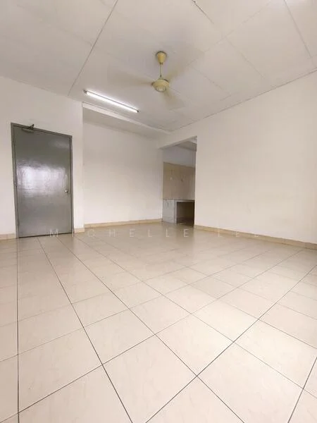 Room features: white painted walls, ceiling with fluorescent lighting, light-colored tile flooring, ceiling fan, open layout, no visible furniture, neutral color scheme, kitchen area visible in background; style: minimalist.