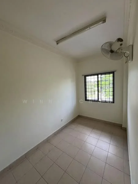 Room features: white painted walls, tile flooring, ceiling fan, window with metal grille, natural light from window.