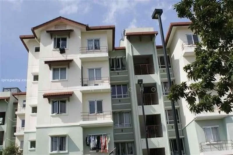 Exterior type: low-rise apartment block; features: cream painted facade, red tiled roof, balconies with metal railings, multiple storeys, visible laundry on balcony, windows with white frames, landscaped greenery in foreground; style: modern.