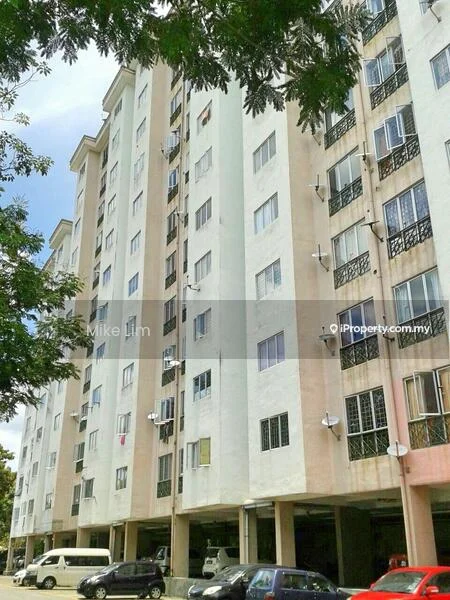 Exterior type: mid-rise condominium; features: white painted facade, balconies with metal railings, multiple windows, ground-level parking area, satellite dishes visible, surrounded by trees, approximately 6-storey high-rise; style: modern.