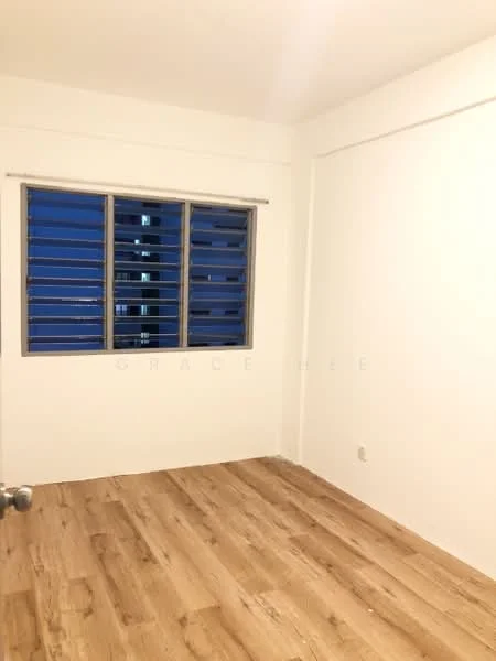 Room features: white painted walls, laminate flooring, sliding window with metal grille, natural light from window, plain ceiling; style: modern.