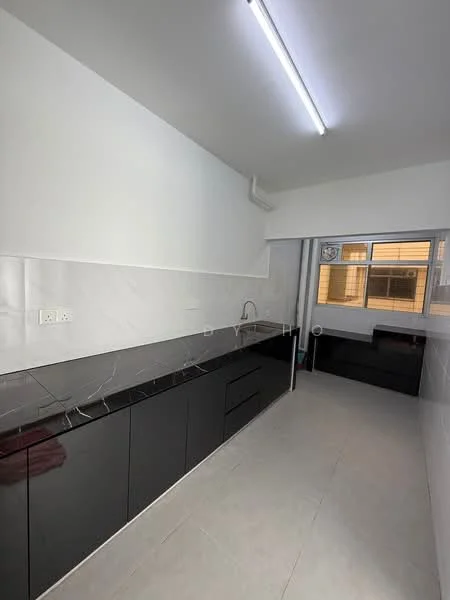 Kitchen features: black cabinetry, marble countertop, single-bowl stainless-steel sink, chrome pull-down faucet, tile backsplash, white painted walls, grey tile flooring, window with view, under-cabinet lighting; style: modern.
