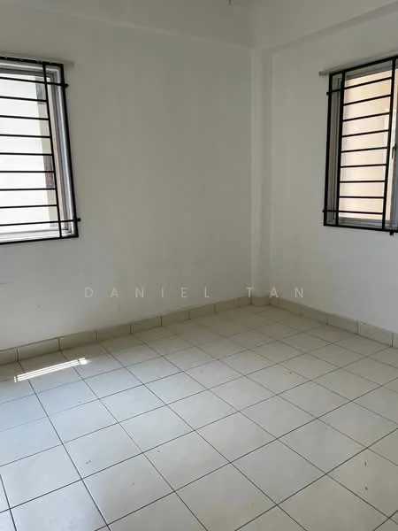 Room features: white painted walls, tile flooring, two windows with black metal grilles, neutral color scheme, no visible furniture, natural light from windows.