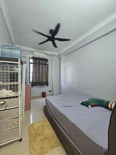 Bedroom features: grey painted walls, white crown moulding, single bed with grey bedding, ceiling fan, window with sheer curtains, laminate flooring, storage rack, area rug, decorative pillow; style: minimalist.