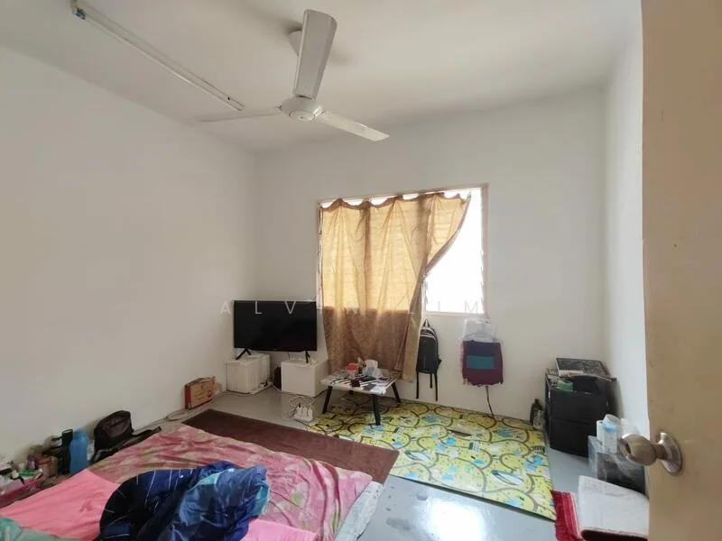 Bedroom features: white painted walls, polished concrete flooring, 5-blade ceiling fan, floor-to-ceiling window, curtains, TV console, area rug with floral pattern, bed with bedding, small table, storage unit.