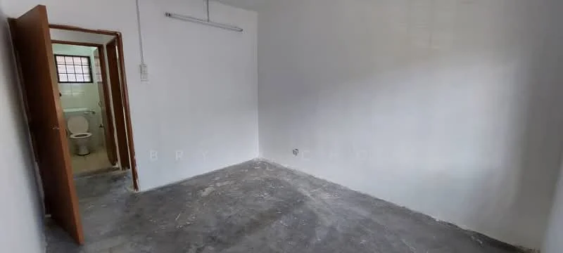 Room features: white painted walls, concrete flooring, single door, window with grid, visible bathroom door, neutral lighting, no visible furniture; style: minimalist.