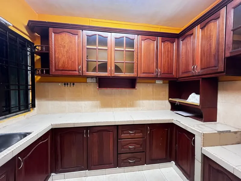 Kitchen features: dark wood cabinetry with glass-front upper cabinets, white tiled backsplash, light-colored countertop, stainless-steel single-bowl sink, chrome faucet, built-in shelving, tile flooring, window with black metal grille; style: traditional.
