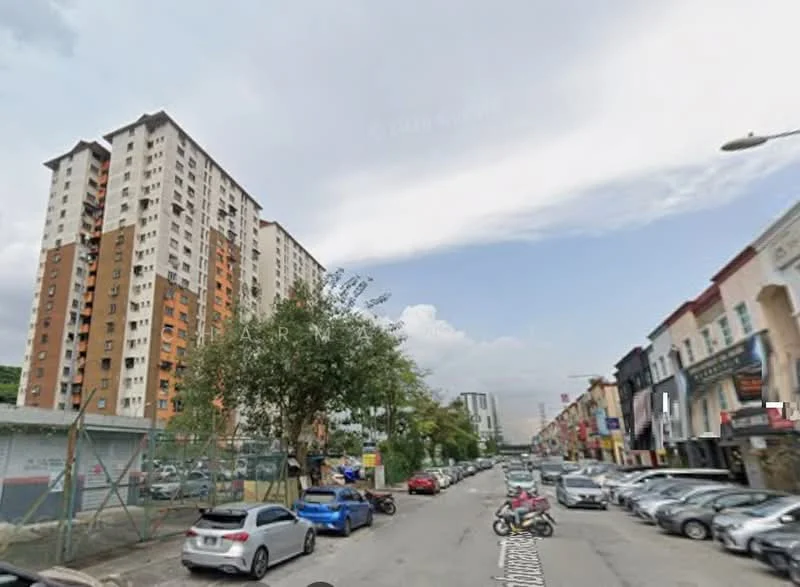 Exterior type: mid-rise condominium; features: orange and white painted facade, approximately 10-storey high-rise, surrounded by mature trees, street view with parked cars, adjacent to low-rise commercial buildings; style: modern.