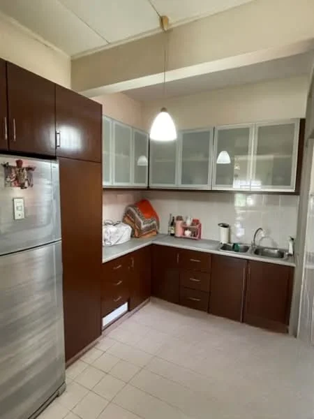 Kitchen features: stainless-steel fridge, brown wooden cabinetry, glass-front upper cabinets, white countertop, single-bowl stainless-steel sink, chrome pull-down faucet, pendant lighting, tile flooring, kitchen towel, kitchen utensils; style: modern.