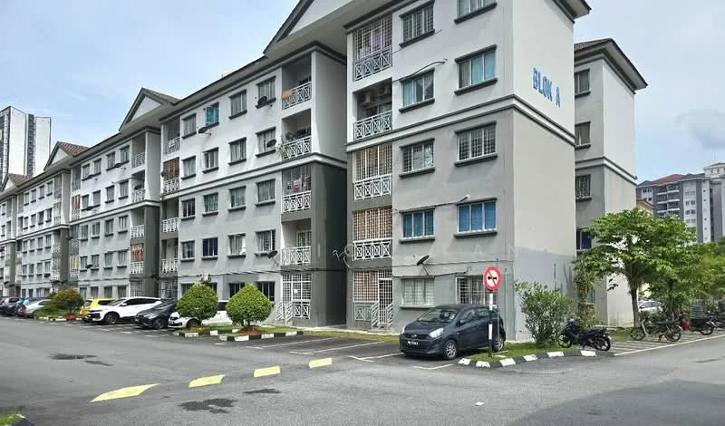 Exterior type: low-rise apartment block; features: grey painted facade, balconies with decorative railings, multiple storeys, landscaped garden with shrubs, manicured lawn, parking spaces visible, surrounded by mature greenery; style: modern.