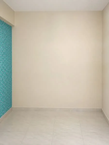 Room features: light beige painted walls, turquoise mosaic accent wall, light-colored tile flooring, no visible furniture or decor; style: modern.