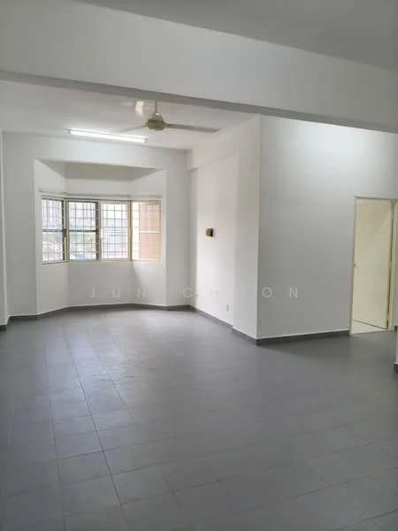Room features: white painted walls, grey tiled flooring, ceiling fan, multiple windows, natural light, corner layout, doorway leading to another room, no visible furniture.