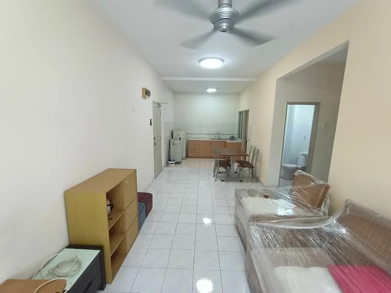 Living features: white painted walls, ceramic tile flooring, 5-blade ceiling fan, recessed ceiling light, sofa with plastic wrap, wooden coffee table, dining table with chairs, open kitchen area, fridge, kitchen cabinetry. Room features: doorway leading to bathroom, doorway leading to kitchen.