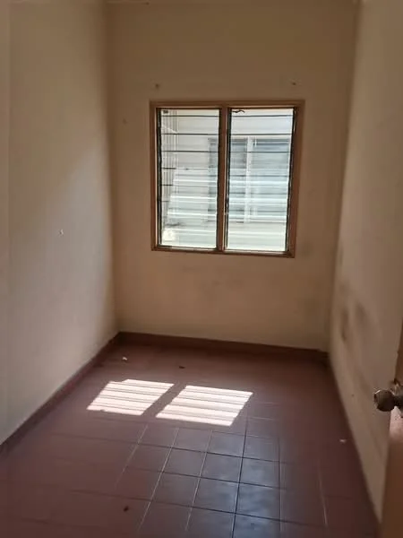 Room features: plain white walls, brown wooden window frame, single window, tile flooring in light brown, natural light from window, no visible furniture or decor.