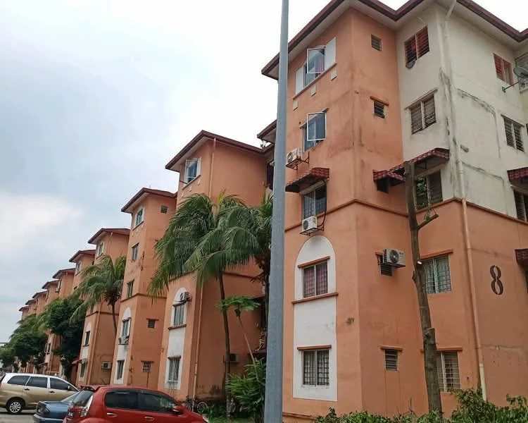 Exterior type: low-rise apartment block; features: orange painted facade, multiple storeys, balconies with railings, air conditioning units visible, palm trees in landscaping, parking spaces visible, streetlight, windows with grilles; style: modern.