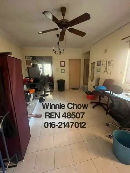 Room features: tiled flooring, ceiling fan, wall-mounted light fixture, window with curtain, wooden door, plastic trash bin, office chair, desk, clothing rack, black storage bin, various exercise equipment, decorative wall mirror.