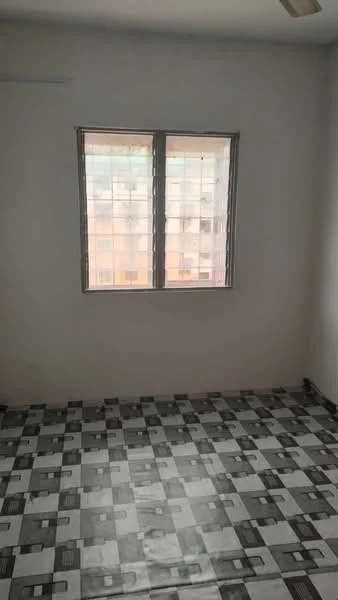 Room features: white painted walls, grey and black patterned tile flooring, two windows with sliding grills, ceiling fan.