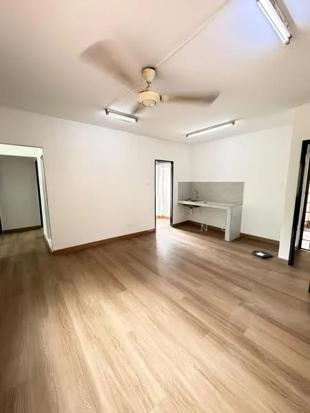 Room features: light wood laminate flooring, white painted walls, ceiling fan, recessed ceiling lights, kitchen area with countertop, sink, open layout, doorway leading to another room; style: modern.