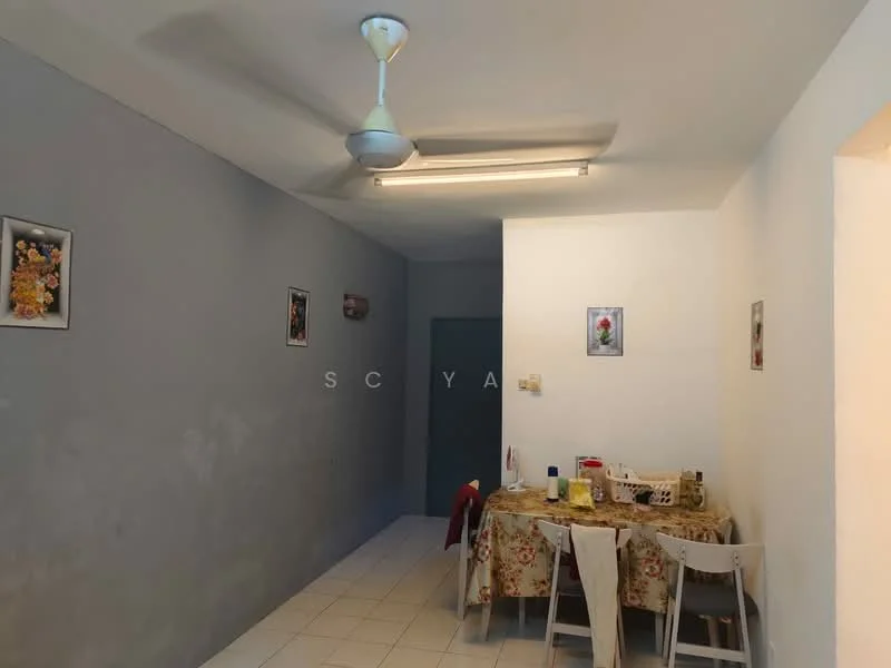 Dining features: grey painted walls, white tiled flooring, ceiling fan, fluorescent ceiling lights, dining table with floral tablecloth, four dining chairs, framed artwork on walls.