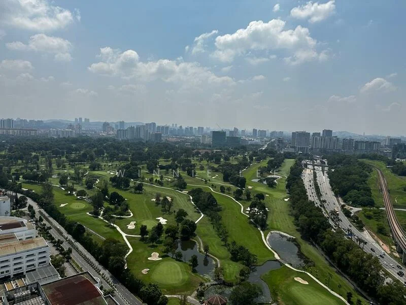 Exterior type: high-rise condominium; features: city skyline view, golf course view, manicured lawns, water features, surrounding greenery, urban landscape, highway visible, multi-storey buildings in background; style: modern.