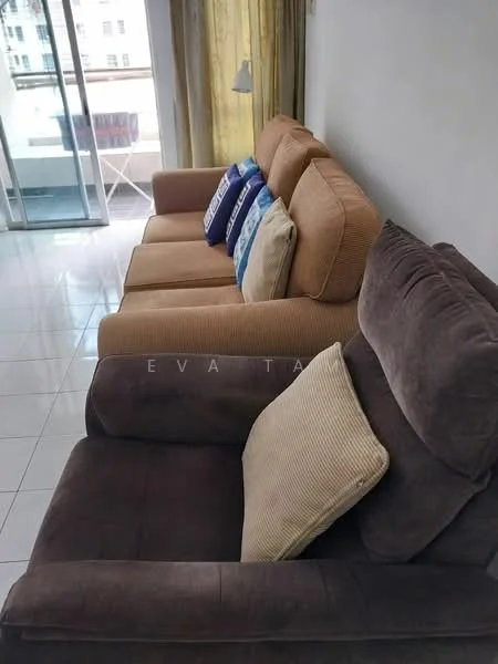 Living features: 3-seater fabric sofa in brown, 2-seater fabric sofa in beige, decorative cushions in blue and white, glass sliding door leading to balcony, white walls, tile flooring, curtains in yellow, coffee table, area rug; style: modern.