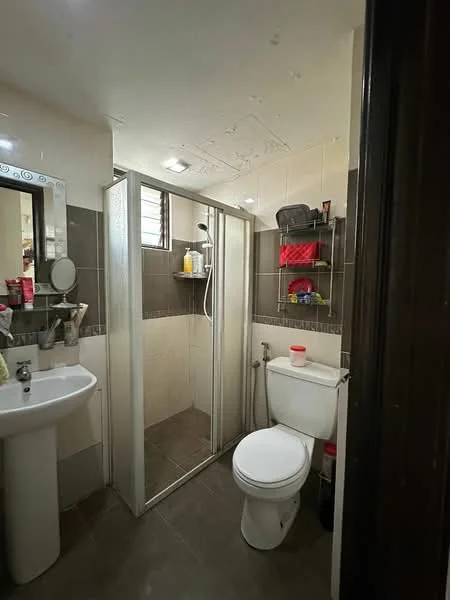 Bathroom features: single-sink vanity with mirror, chrome basin mixer faucet, toilet, walk-in shower with glass enclosure, handheld shower, tile cladding on walls, dark tile flooring, shelves for toiletries, light fixtures in ceiling; style: modern.