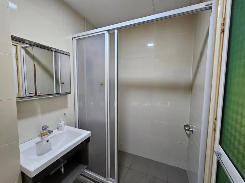 Bathroom features: single-sink vanity with grey cabinet, framed mirror above sink, glass shower enclosure, chrome faucet, white tiled walls, grey floor tiles, shower head, soap dispenser, toilet paper holder; style: modern.