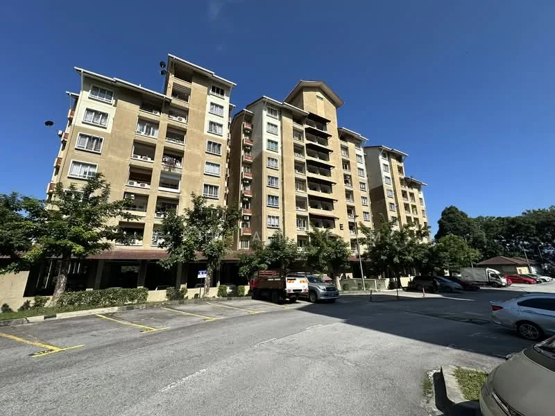 Exterior type: mid-rise condominium; features: cream painted facade, balconies on upper floors, landscaped garden at base, parking lot in front, multiple storeys, surrounded by trees, visible windows, entrance canopy; style: modern.