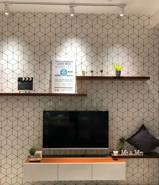 Living features: geometric patterned wall tiles, floating wooden shelves, wall-mounted TV, white media console, decorative plants on shelves, framed artwork, decorative cushion, wooden accent shelf, spotlights on ceiling; style: modern.