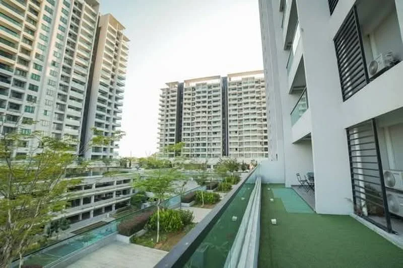 Exterior type: high-rise condominium; features: multiple high-rise buildings, landscaped gardens, balconies with glass railings, greenery and trees, open-air walkways, modern architectural design, visible air conditioning units, well-maintained outdoor space; style: modern.