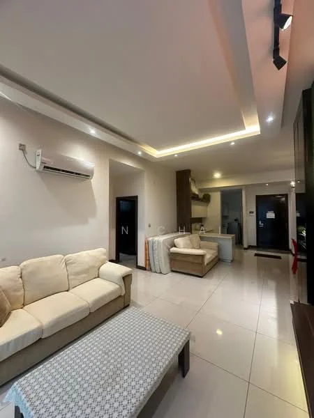 Living features: cream fabric sofa, coffee table, wall-mounted air conditioning unit, recessed ceiling lights, tile flooring, neutral wall color, open layout to kitchen, built-in cabinetry, kitchen island, doorway to hallway; style: modern.