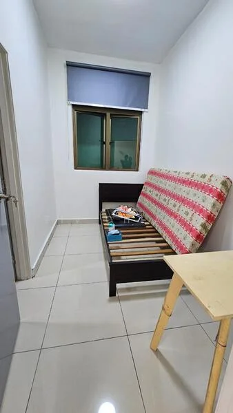 Room features: white painted walls, grey window with roller blinds, tiled flooring, single bed with patterned upholstery, wooden bed frame, small wooden table, window with view, decorative items on bed; style: minimalist.