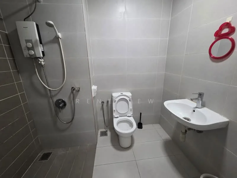 Bathroom features: white toilet, single-sink vanity with chrome faucet, shower with handheld shower head, wall-mounted water heater, grey tiled walls, light grey floor tiles, mirror above sink, toilet brush holder; style: modern.