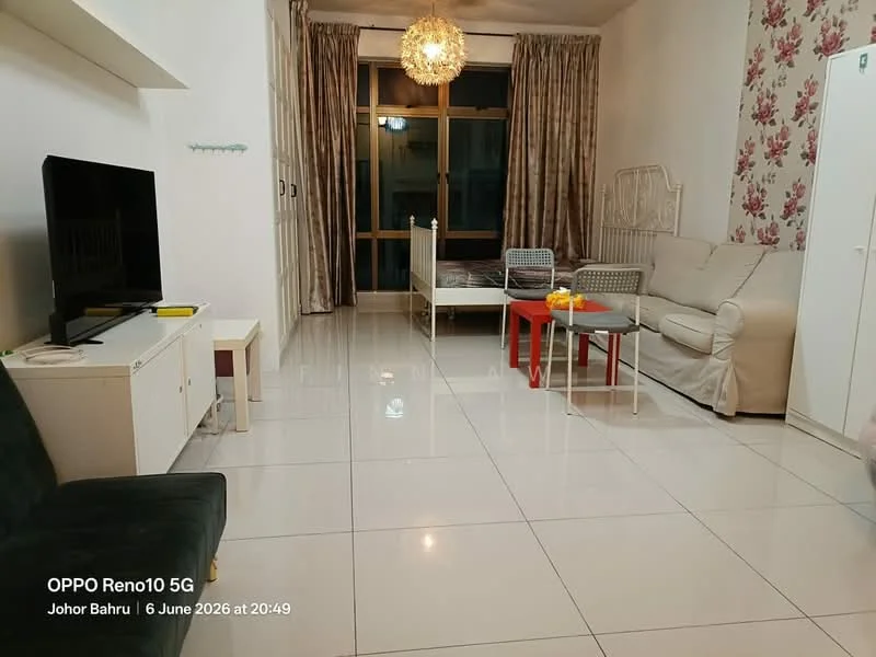 Living features: cream painted walls, white tiled flooring, large window with city view, floor-to-ceiling curtains, 3-seater fabric sofa in beige, coffee table with red legs, small round table with yellow fruit bowl, TV console with wall-mounted TV, decorative wall with floral pattern, bed with white frame and patterned bedding, white wardrobe, decorative light fixture; style: modern; view: city.